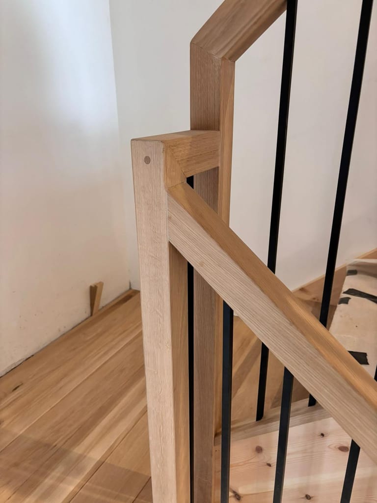 Modern oak staircase with black metal spindles 6