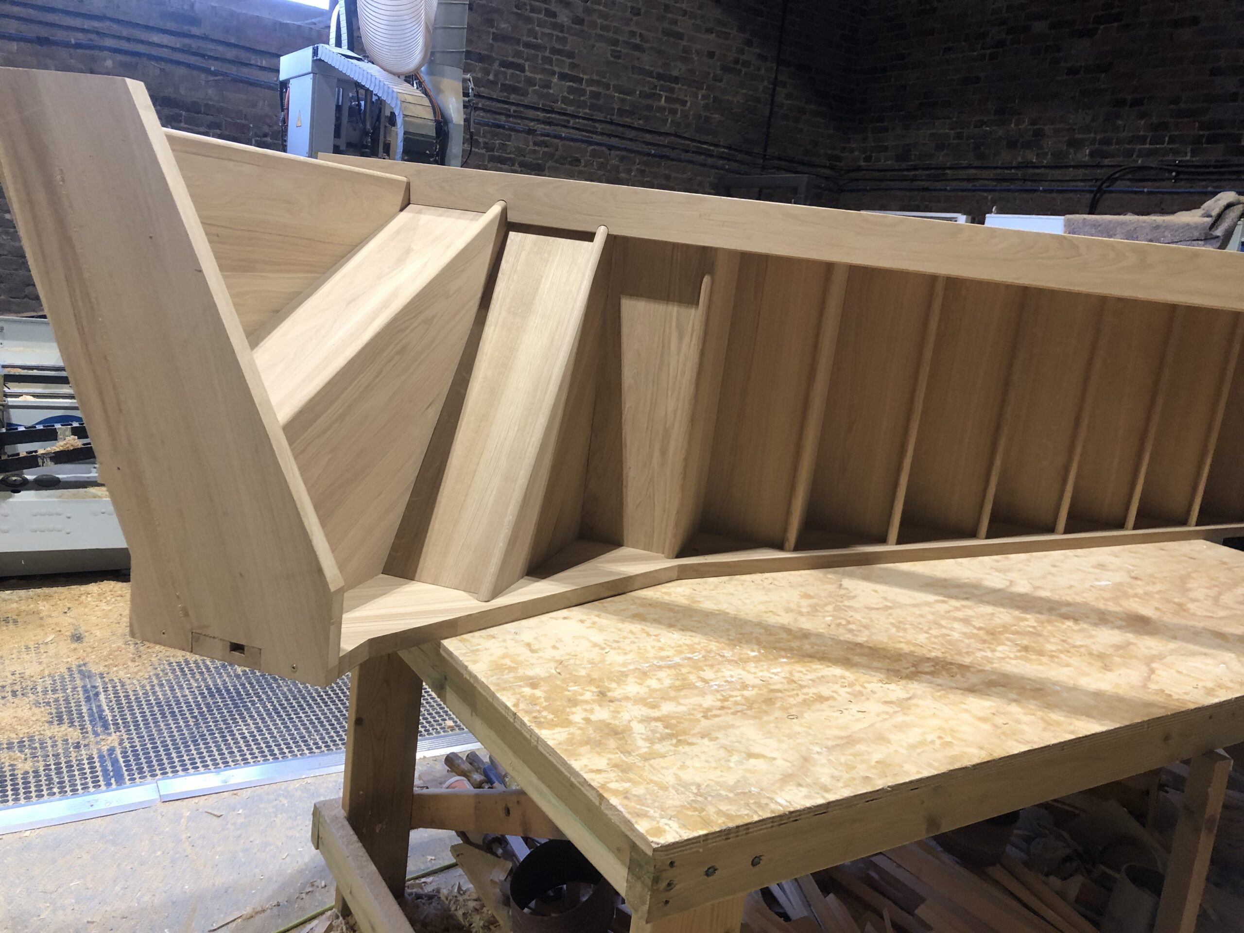 Oak staircase with black metal spindles