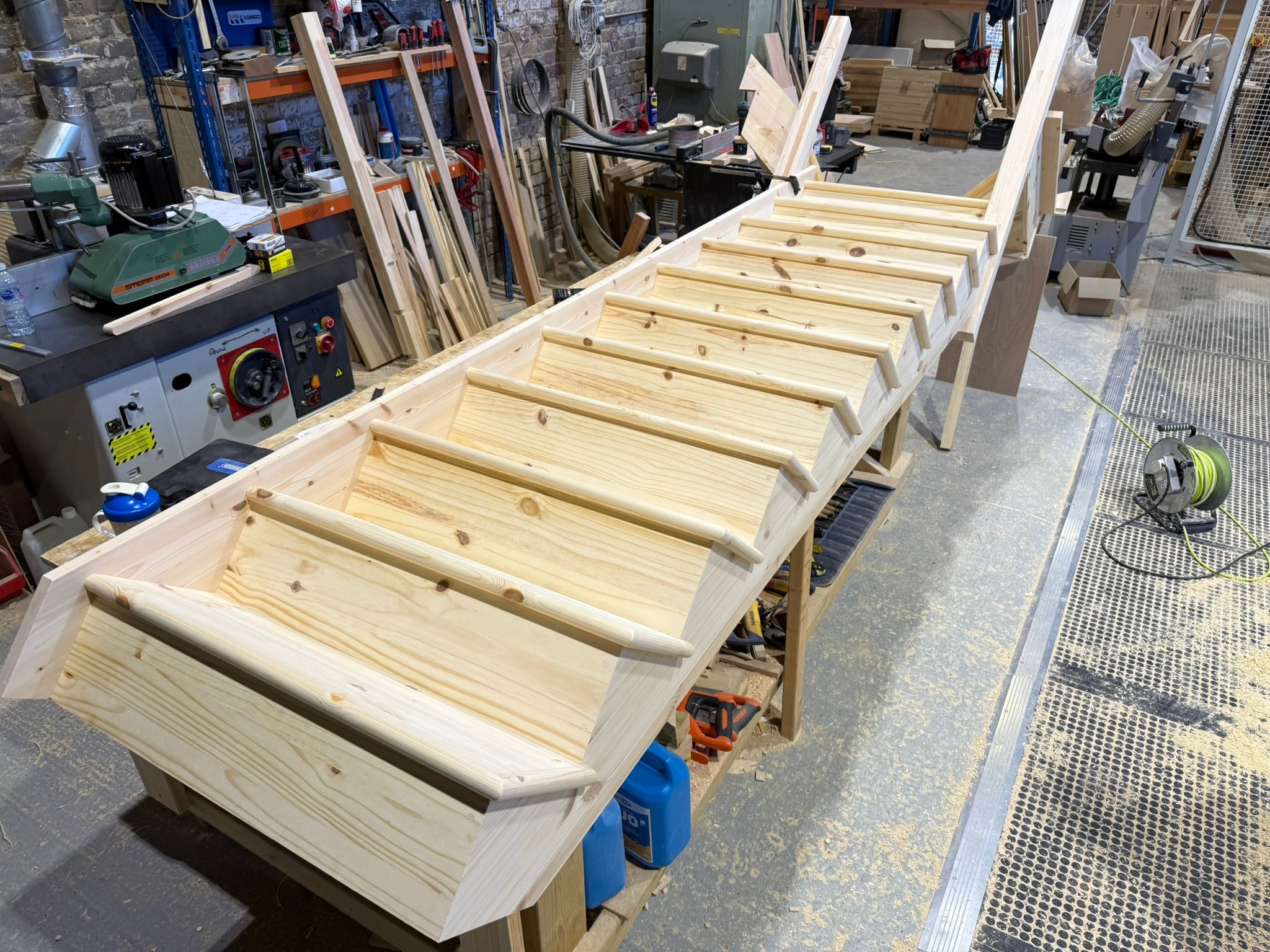 Wooden stair frame under construction in workshop