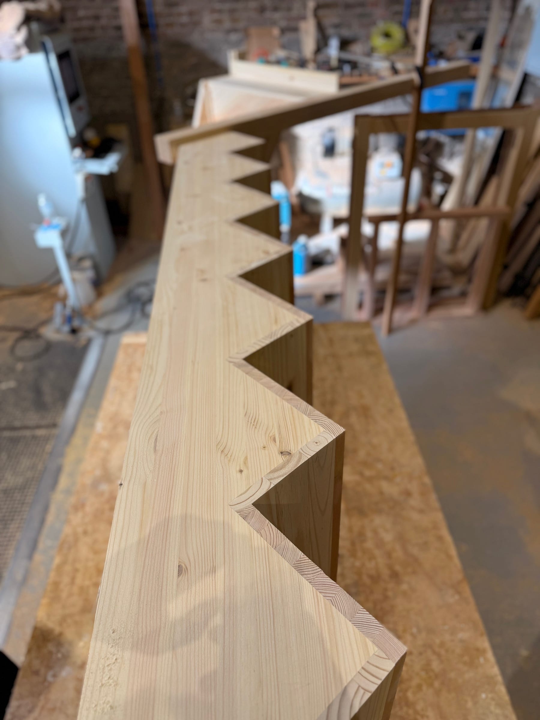 Stepped profile of a softwood cut string staircase, made to be clad